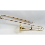Trombone - A 'Blessing Scholastic Elahart.Ind USA' brass tromphone, in fitted case.