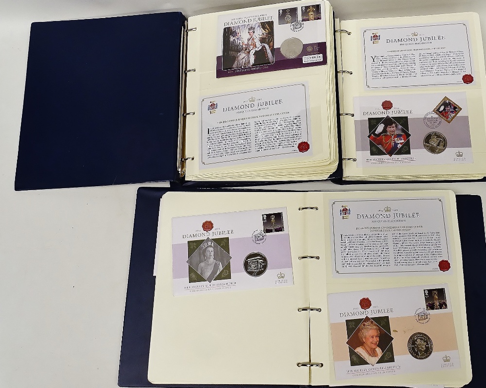 COINS - A Diamond Jubilee folder containing 22 coins, to include £5, £2, crowns, $1, another