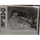 Pop Culture - A black and white film poster depicting Clark Gable in 1940 driving a two seater car