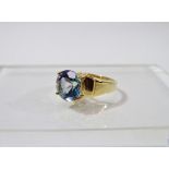 9ct Gold and Topaz Ring - A gold ring set a large Brazilian topaz, size N/O, weight 5.6g, together