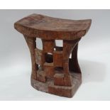 Ethnographic Native Tribal - A carved hardwood stool with chequer like decoration and hollow central