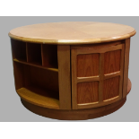 Mid Century Furniture - A Nathan drum circular three cupboard coffee table with adjustable
