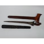 East Asian Kris and Irish Truncheon - A kris with a watered steel blade within a hardwood