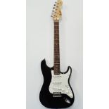 Guitar - Stratocaster electric guitar, badged fender, with solid body and bolt on neck, three single