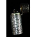 Silver Perfume - A silver cylindrical perfume with engraved foliate decoration, London 1885, maker's