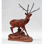 Black Forest stag - A stag on naturalistic rectangular base, height 28cm, length 23cm.