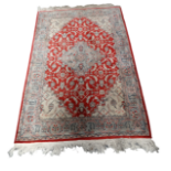 Indo Persian rug - An Indo Persian hand knotted woollen pile rug with three borders and large