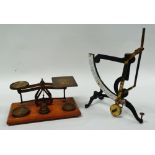 Postage scales etc - A set of brass postal scales on an oak plinth with a set of six brass
