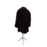 Ladies fur coat - A chocolate brown coat, size 10/12, length 90cm.
