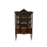 Edwardian display cabinet - A mahogany inlaid two door, bow fronted display cabinet on square