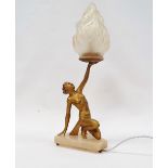 Art Deco table lamp - A gilt spelter table lamp modelled as a scantily clad lady holding aloft a