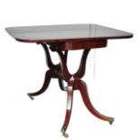 Regency tea table - A mahogany crossbanded D-shaped tea table on four outswept legs and castors,