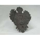 19th century pewter plaque - A continental shaped lead plaque decorated with the Madonna and