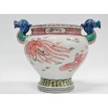 19th century Chinese vase - A Chinese vase with twin handles modelled as dragon heads, the bulbous