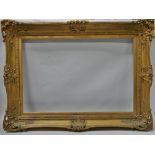 Gilt picture frame - A gilt picture frame, sight size 49 x 75cm, overall size 71 x 98cm.