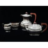 Silver plated tea set - To include a teapot, a hot water jug, height 23.5cm, a milk jug and a