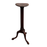 Torchiere - A 20th century mahogany cluster column stand with circular top on carved cabriole