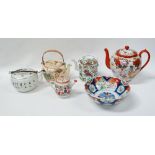 Japanese and Chinese teapots - A Japanese teapot with bamboo handle decorated with flowers and