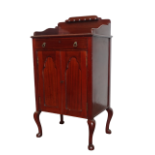 Smoker's cabinet - A 20th century mahogany smoker's cabinet with a single drawer above two doors