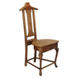 Valet chair - A 20th century chair with oak shaped seat above two hinged drawers on cabriole legs