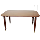 Reproduction mahogany breakfast table - A mahogany table with four detachable legs and brass