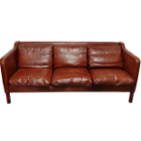 Danish leather sofa - A brown leather three seater sofa on short square legs, height 76cm, width