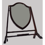 Edwardian dressing mirror - A mahogany and boxwood strung shield shape skeleton dressing mirror with