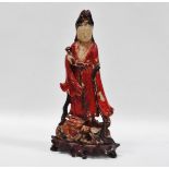 Chinese soapstone figure - A painted soapstone female figure with a dragon at her feet on a carved