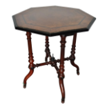 Octagonal occasional table - A late Victorian inlaid walnut occasional table on four turned legs,