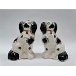 Staffordshire spaniels - A pair of opposing King Charles spaniels, height 19.5cm.