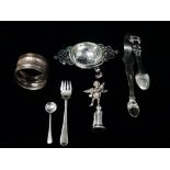 Silver - A napkin ring, a salt spoon and a small fork, weight 35.7cm, together with a 800 silver