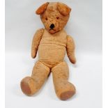 Teddy Bear - An old mohair covered teddy bear with jointed arms and legs, swivel head and glass