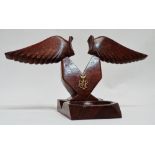 RAF mahogany pocketwatch stand - constructed from a laminated propeller and incorporating a pocket