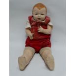 An Effanbee 'Bubbles' composition doll - open mouth, articulated eyes, cloth body and composition