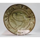 Wenford Bridge Pottery - Seth Cardew (1934-2016), a large charger decorated with a bird, within a