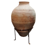 A large terracotta olive oil jar - of typical ovoid form with an incised dotted band to centre and