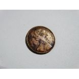 Coins - a Victoria one penny 1864.