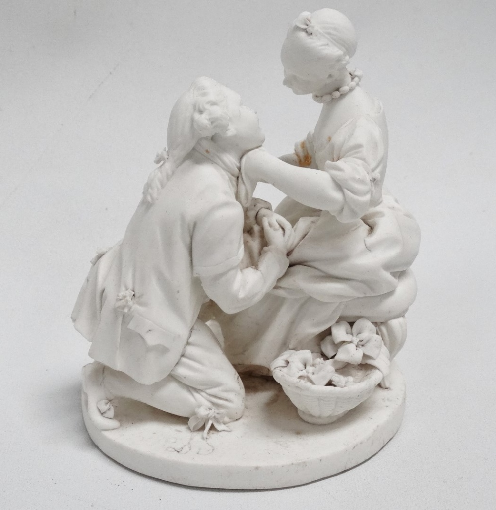 A late 19th century German parian figure group - the gentleman kneeling before his beau, height