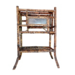 A late 19th century bamboo magazine rack - incorporating lacquer panels showing chrysanthemums,