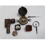 A RAF machine gun sight - together with another reflecting sight, a compass, an RAF oil gauge and an