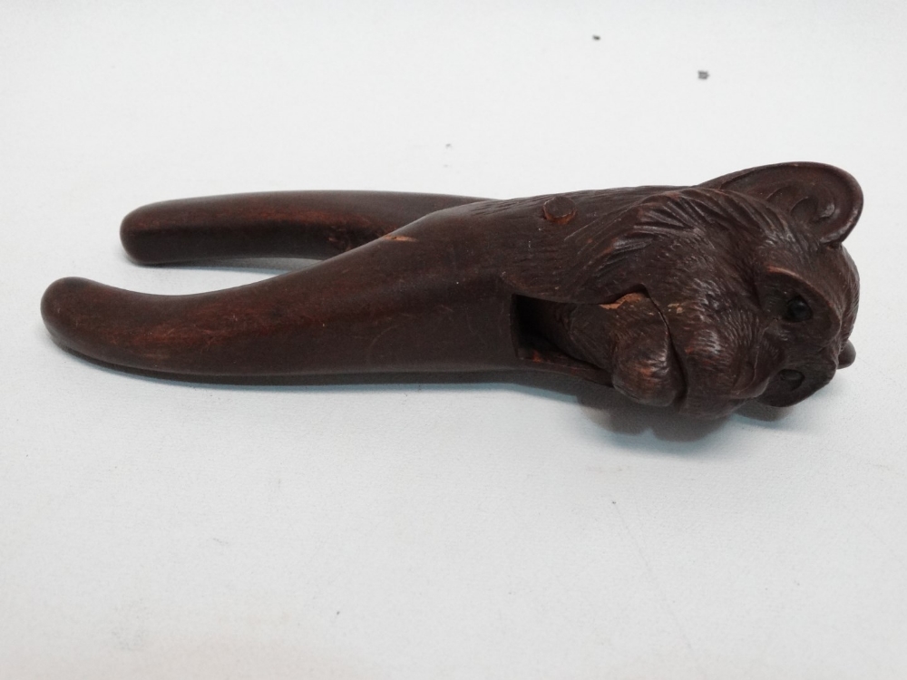A pair of early 20th century Black Forest nut crackers - modelled as a monkey, together with a - Image 4 of 7