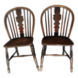 A pair of mid 19th century ash and elm Cornish country chairs - with a solid shaped splat above