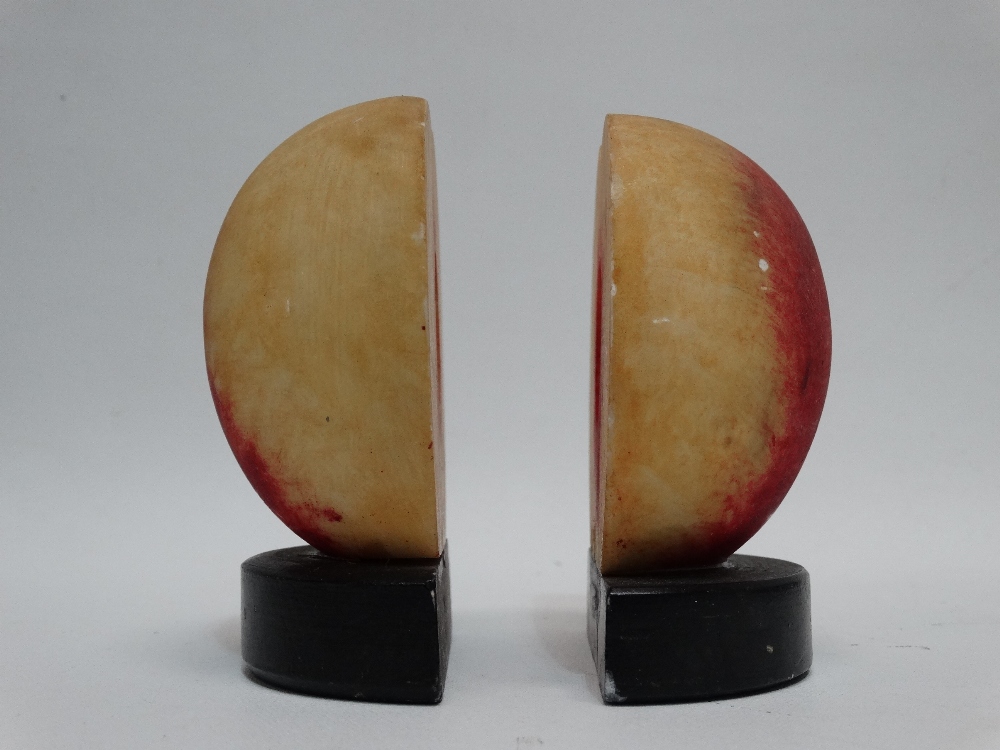 A pair of composite bookends - modelled as a sliced peach, height 10cm. - Image 3 of 3