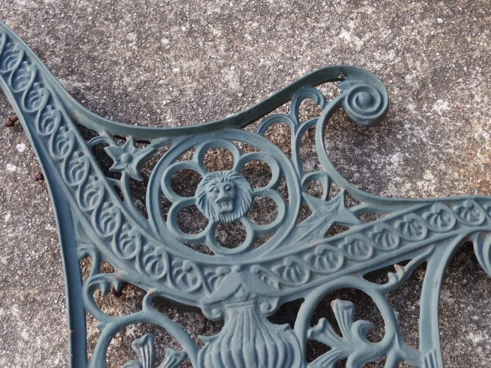 A pair of 20th century cast iron bench ends - decorated with flowers and foliage, height 77cm, depth - Image 2 of 2