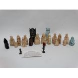 A part set of Lewis chess pieces - resin cast, together with similar glazed pottery pieces, two