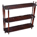 A mid 19th century mahogany three tier hanging shelf, height 57.5cm, width 68.5cm, depth 17.5cm.