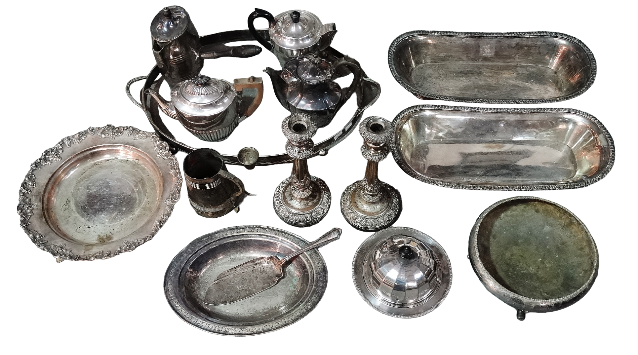 A quantity of silver plate - including a pair of candlesticks, pint tankard, hot chocolate pot, pair