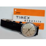 A Timex gentlemans electric wristwatch - steel cased with champagne dial and arrangement of Arabic