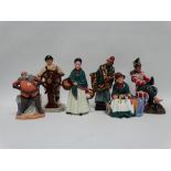 A Royal Doulton figure - Carpet Seller, HN1464, height 24cm, together with five further figure