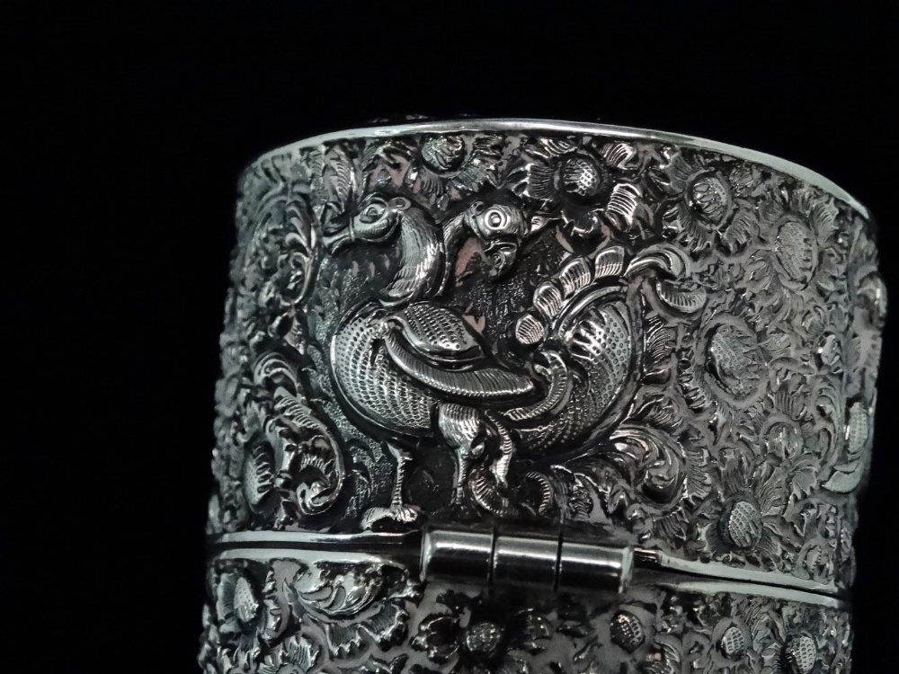 An Indonesian silver cylindrical scribes box - Extensively decorated with figures and birds on a - Image 7 of 10